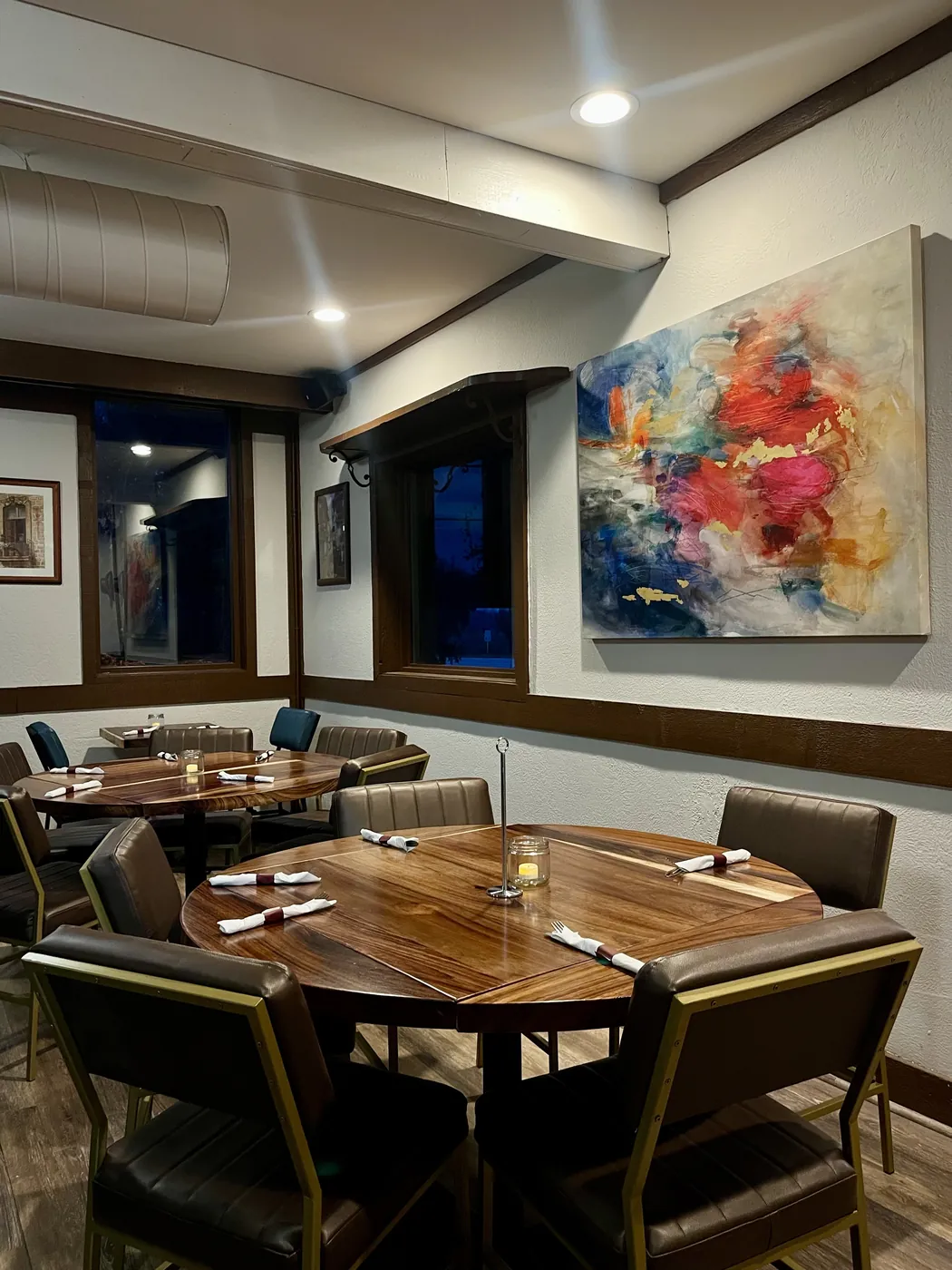 Dining table and artwork inside El Molino